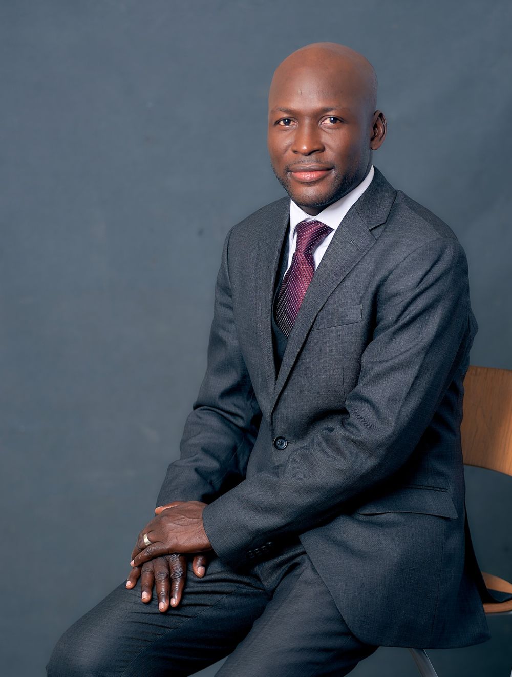 Portrait of the Underground founder, with a government seat of power in the background